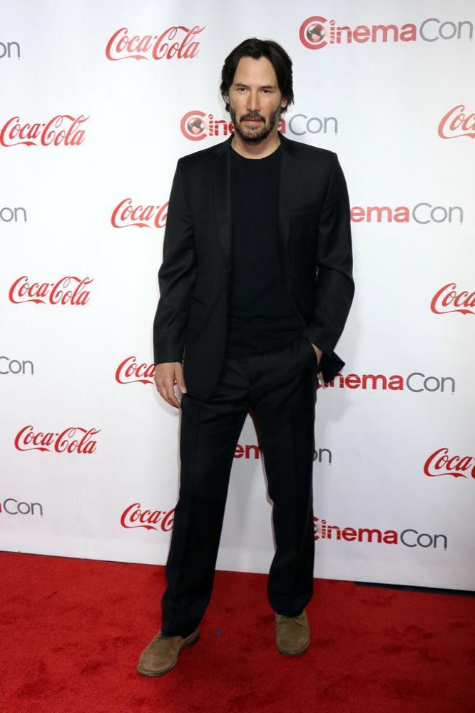 Keanu Reeves actor standing portrait