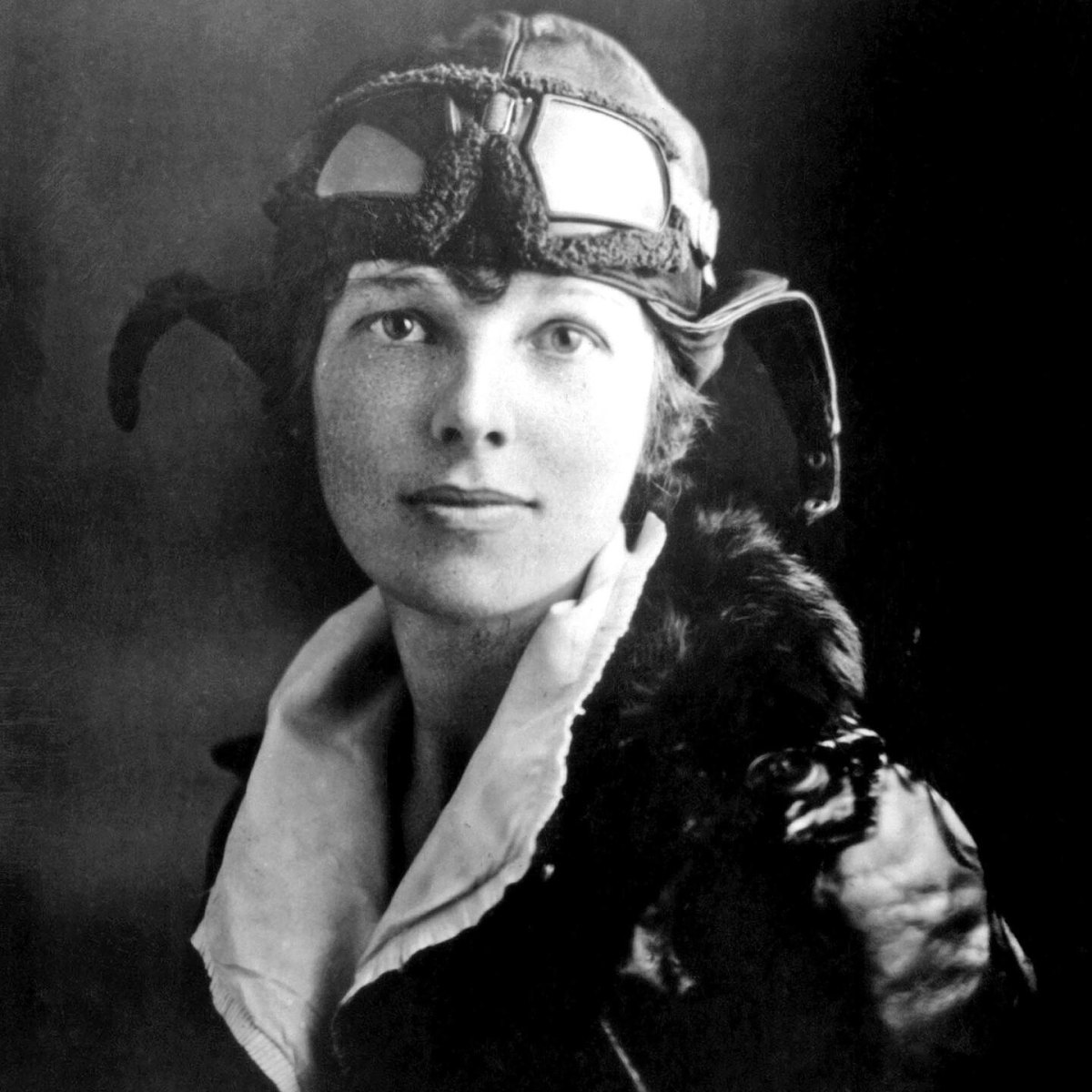 Amelia Earhart with airplane