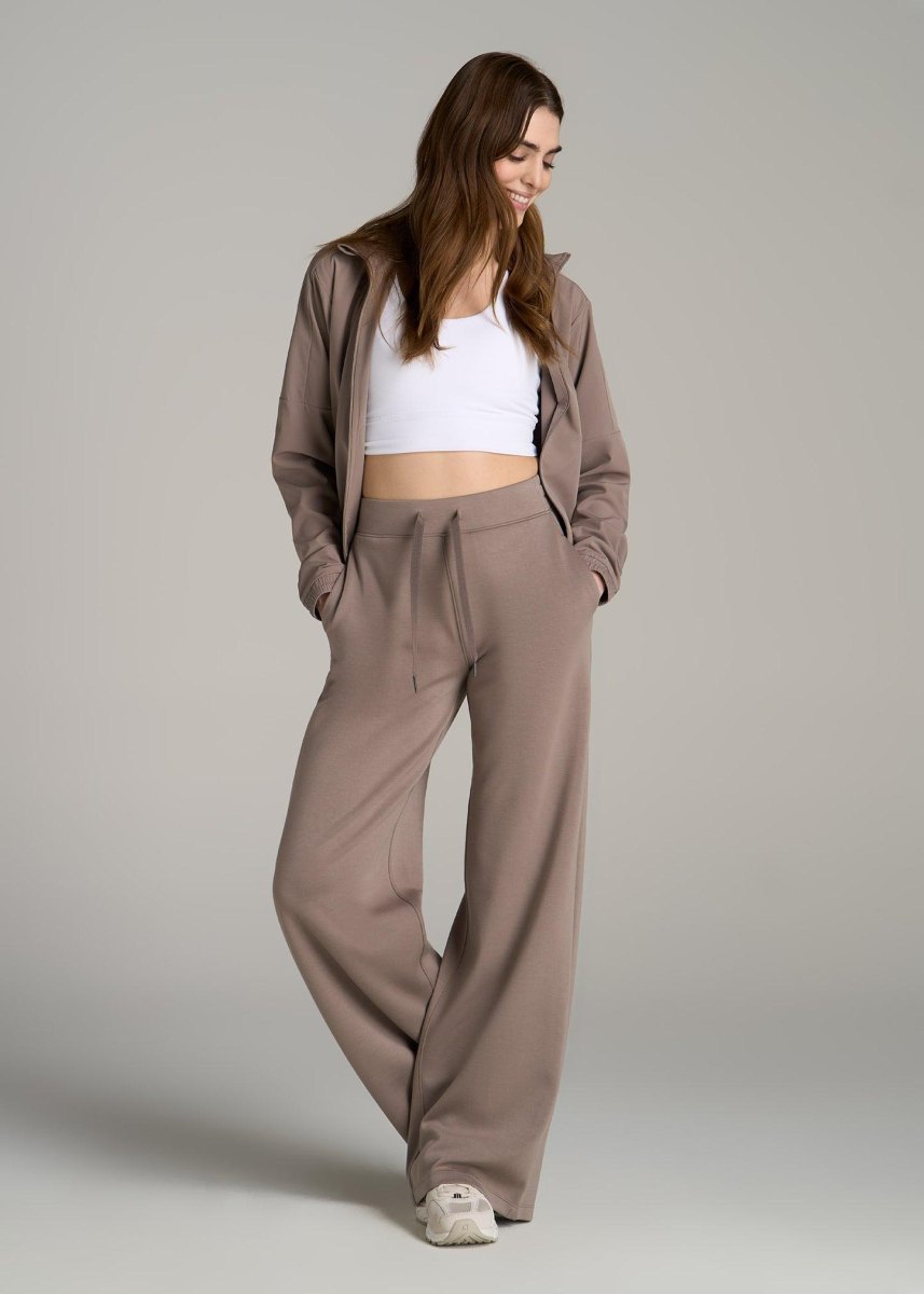 Tall model wearing athletic fashion