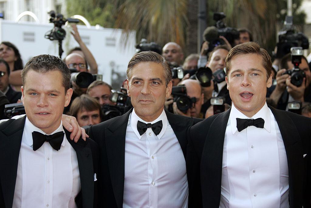Male movie stars at event