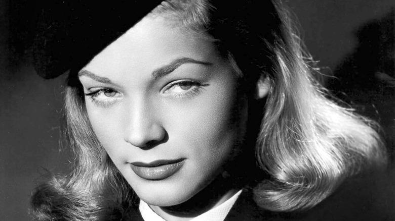 Vintage arched brows and defined Hollywood eyes