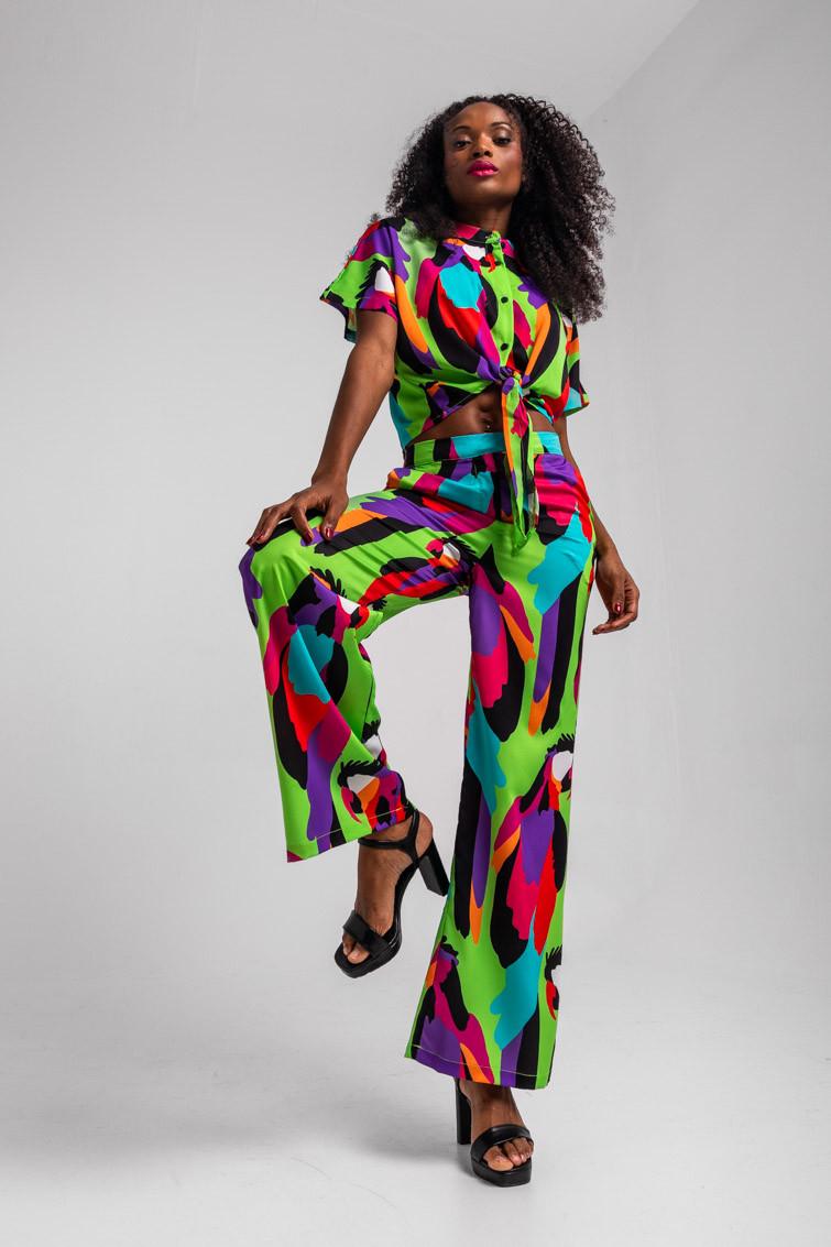 Tall model wearing bold print outfit