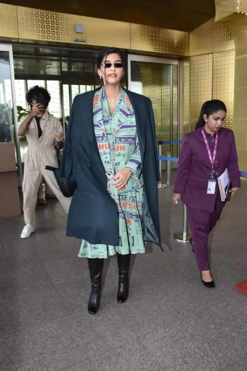 Celebrity dress layered airport outfit