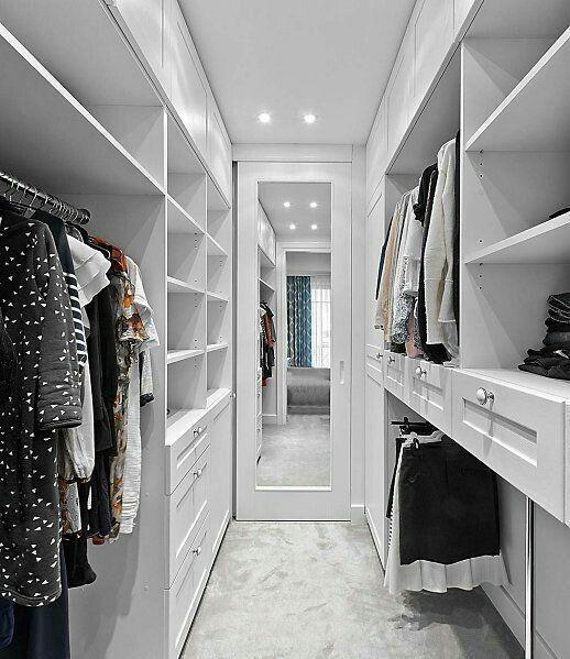 Light colored tiny walk-in closet