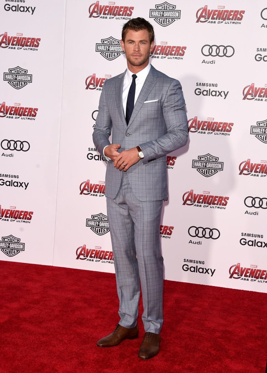 Chris Hemsworth standing at a public event
