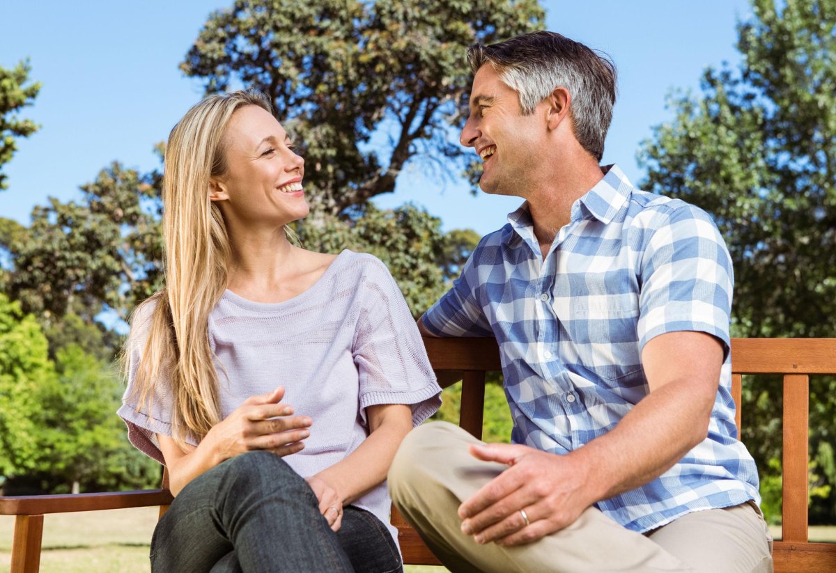 Couple having conversation outdoors