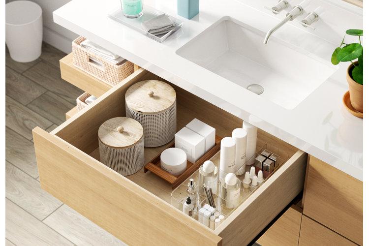 Minimalist bathroom drawer with neutral organizers and neatly arranged essentials