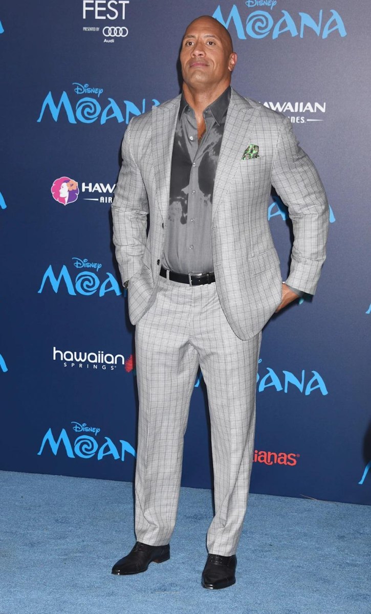 Dwayne Johnson standing at a public event