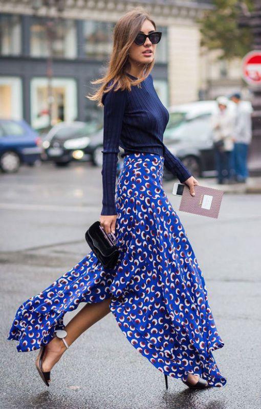 Tall woman wearing feminine skirt outfit