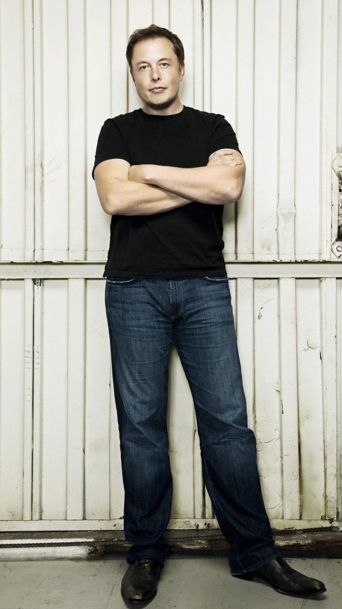 Elon Musk standing public figure