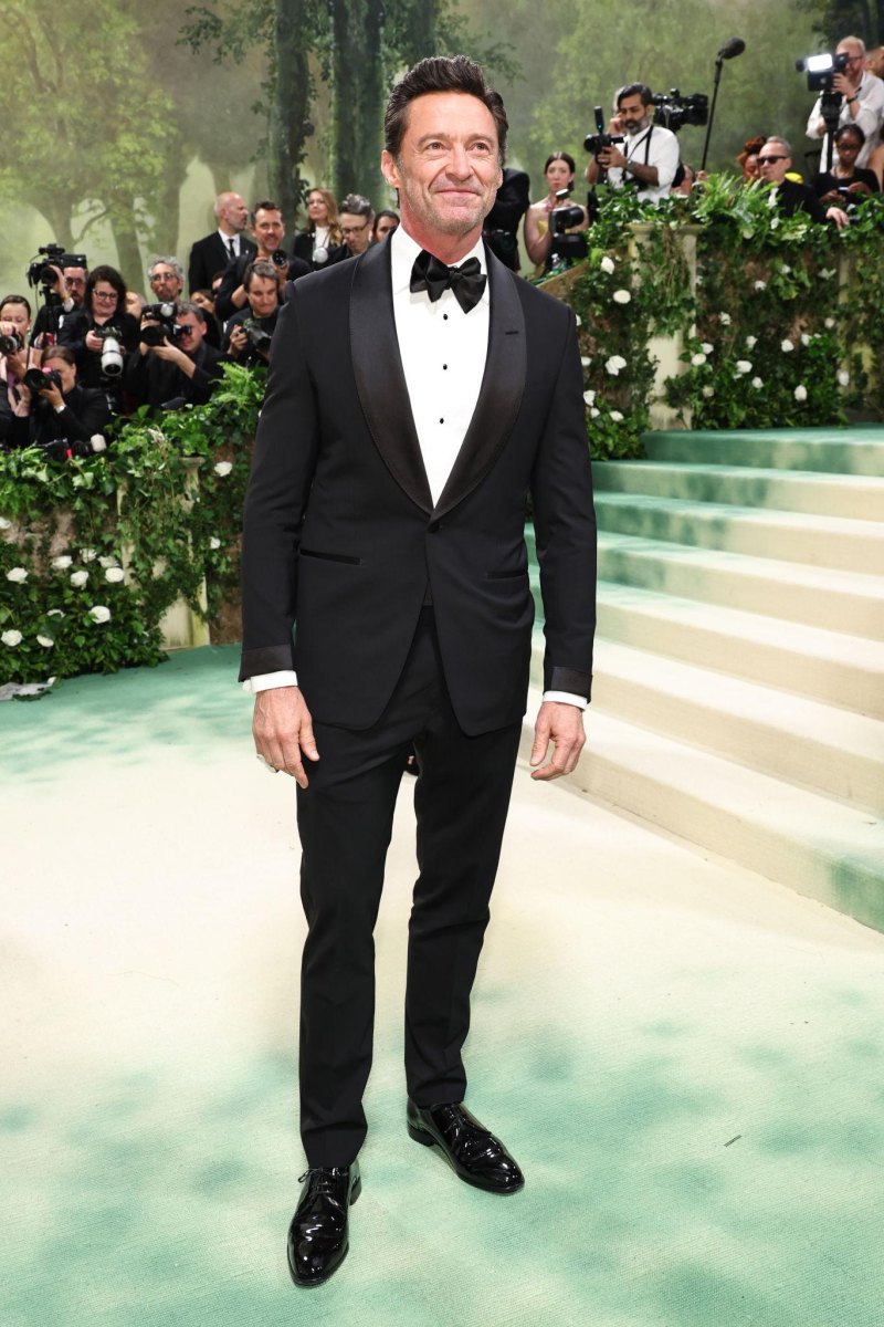 Hugh Jackman standing at a public event