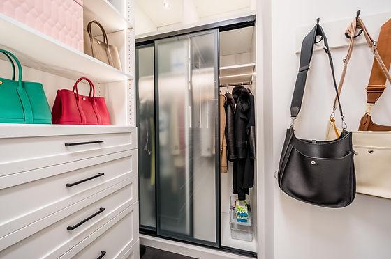 Sliding doors on tiny walk-in closet