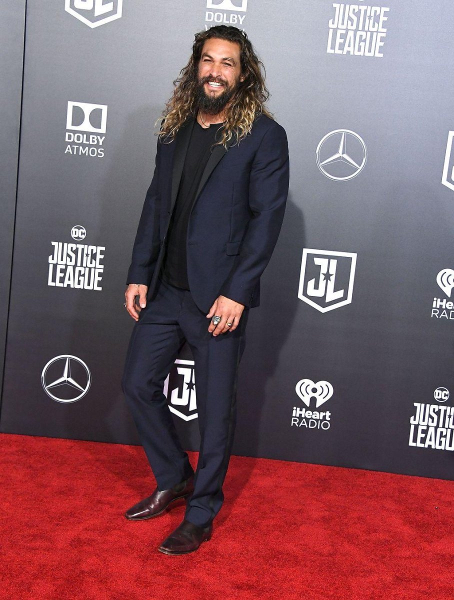 Jason Momoa standing at a public appearance