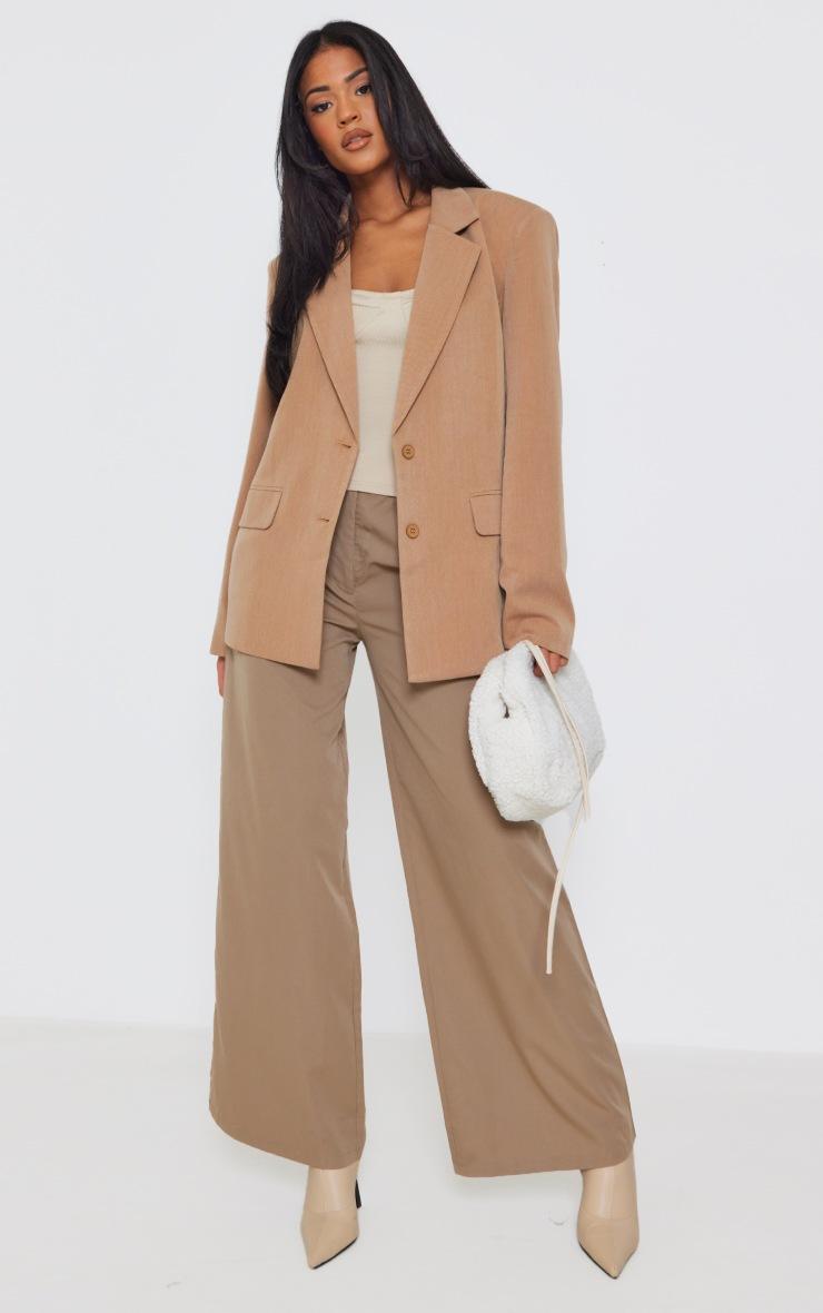 Tall model in oversized tailored suit