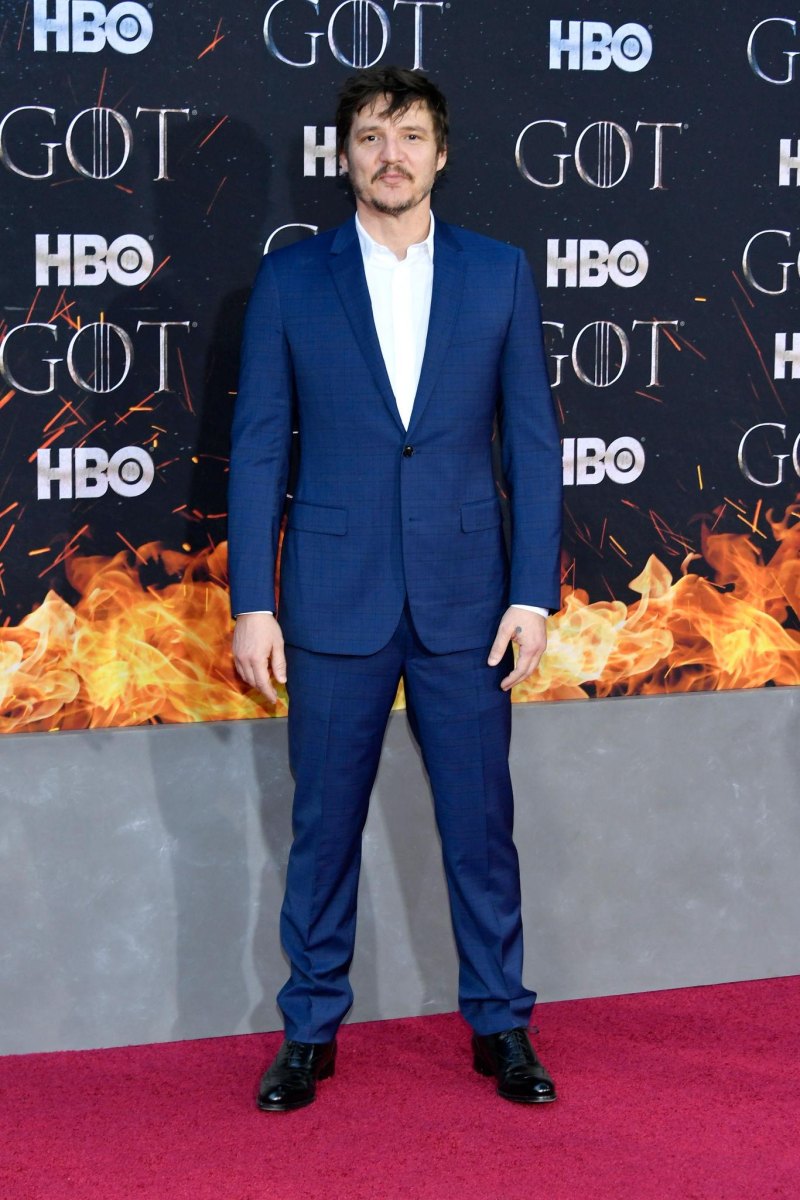 Pedro Pascal standing at a public event