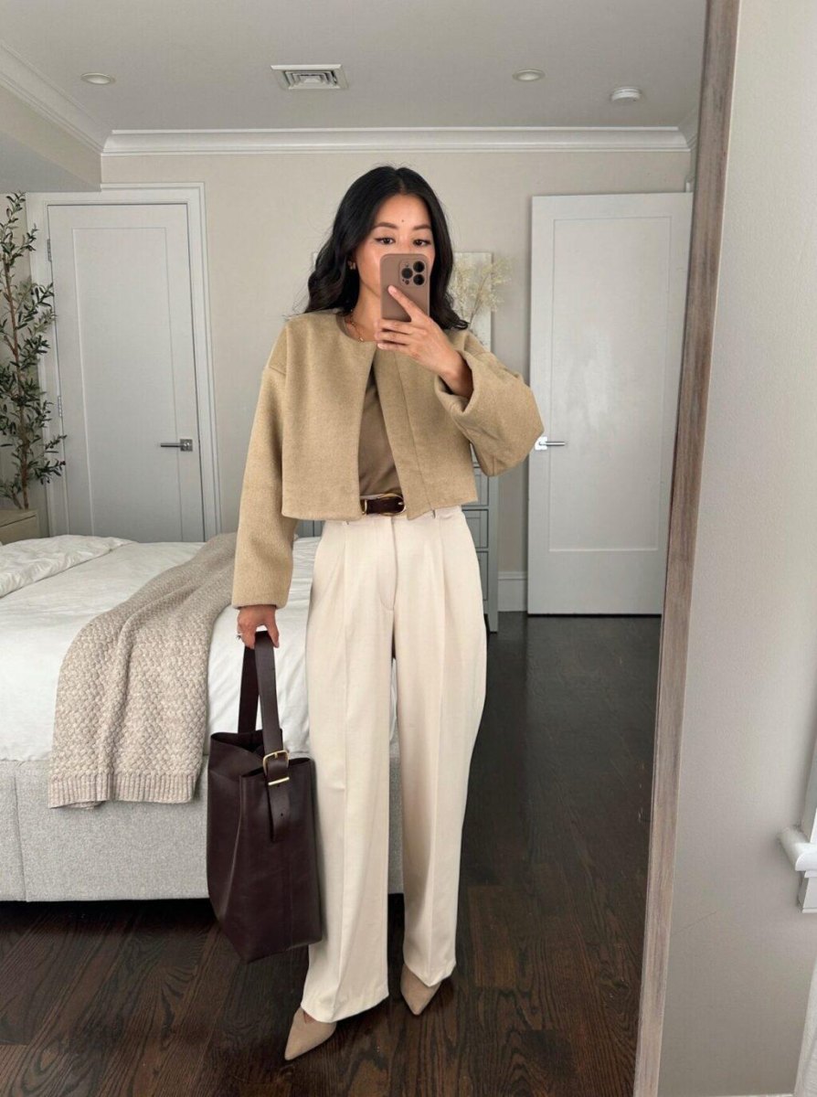 Petite woman wearing cropped jacket