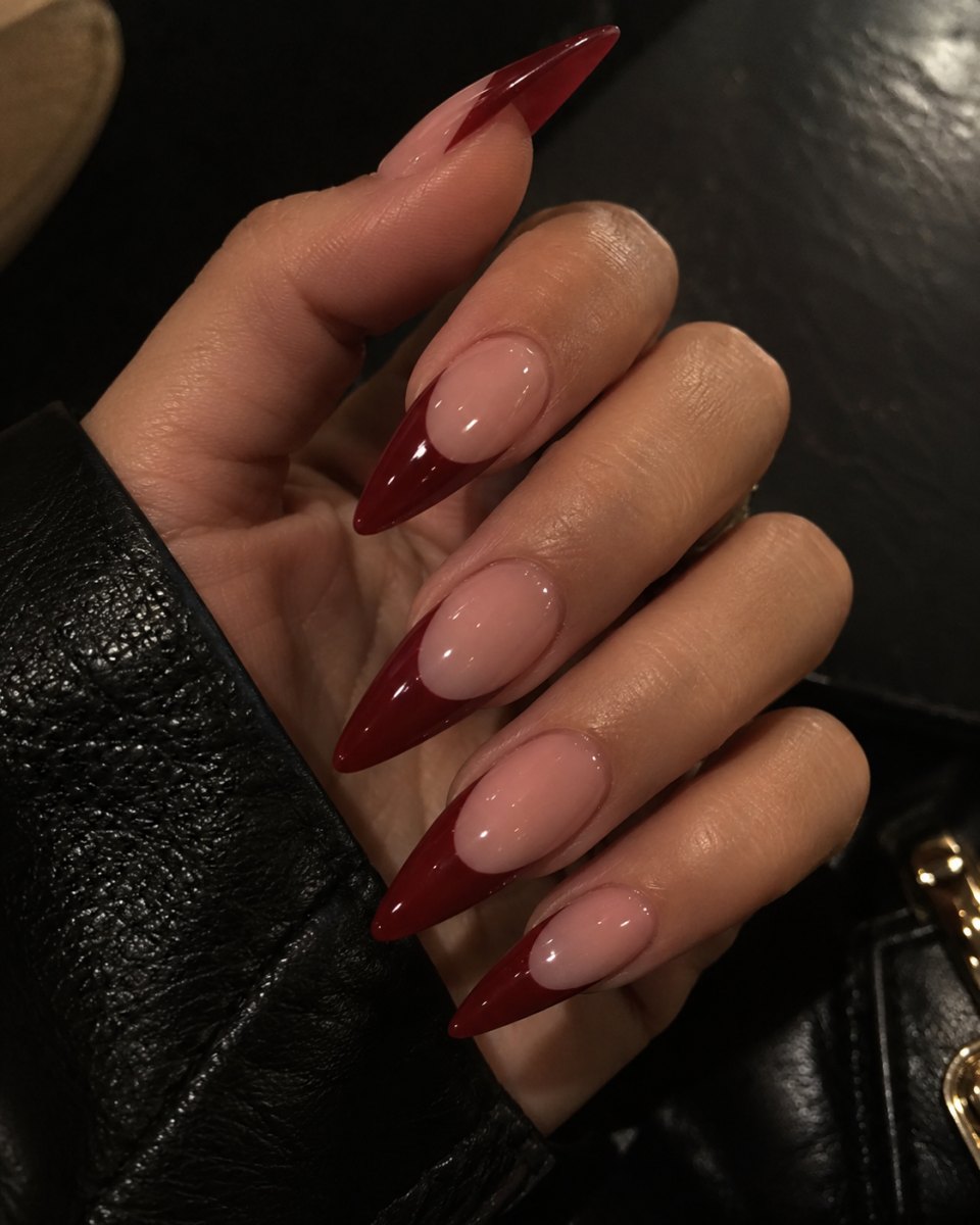 Bold red French manicure on nails