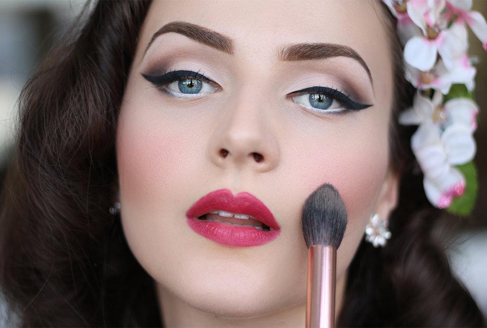 Sculpted cheekbones with vintage rouge