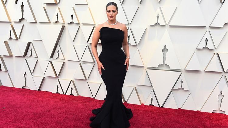 Sleek black evening gown with a modern halter neckline