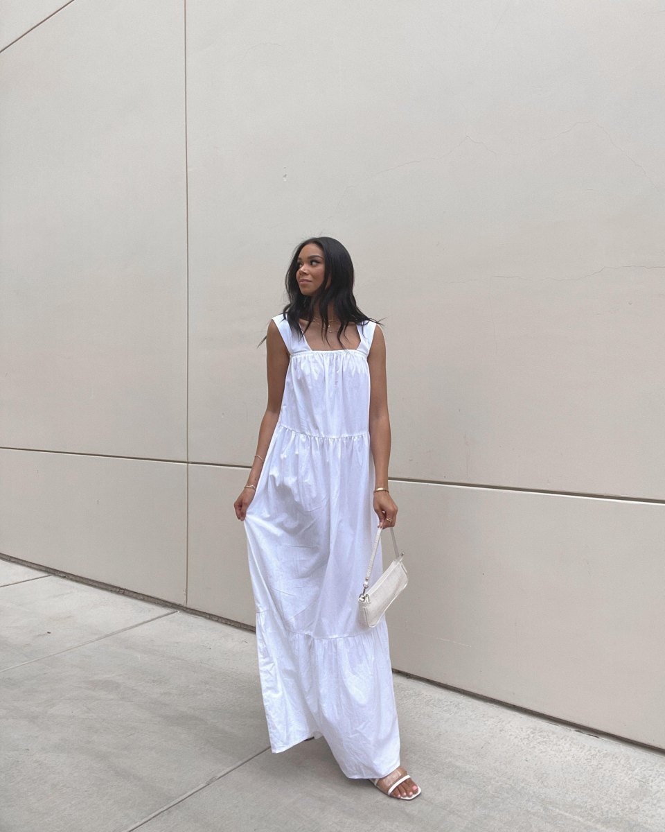 Tall woman wearing summer dress