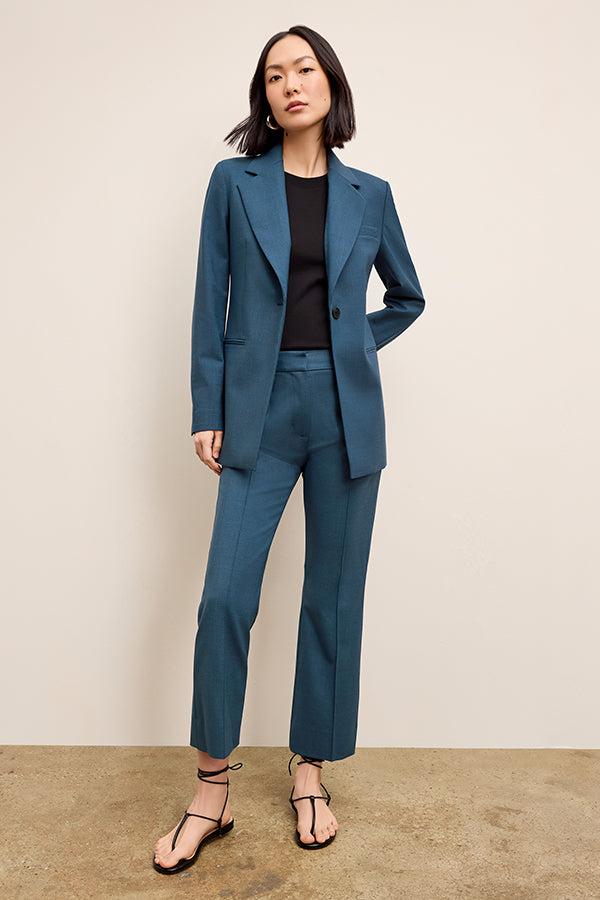 Petite woman wearing tailored clothes