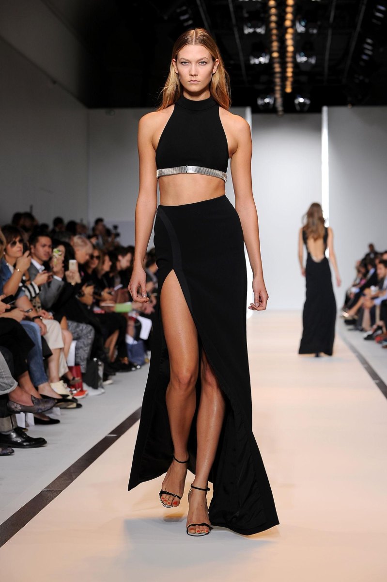 Tall female fashion model on runway