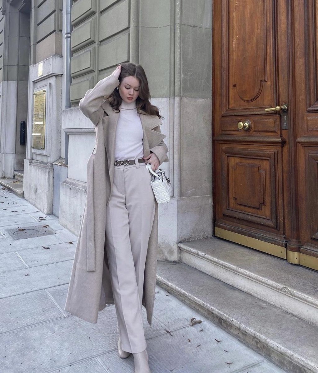 Petite woman wearing monochrome outfit